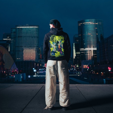 Black Hoodie — UFA 2025, worn from behind, skyline