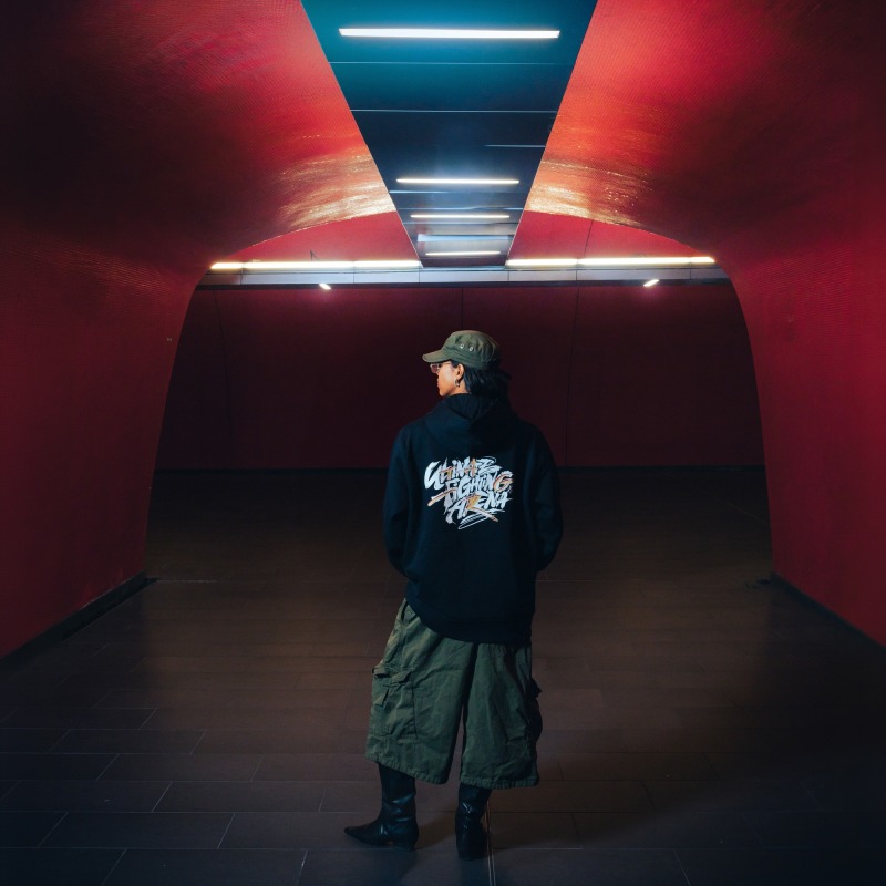 Autumn Edition Hoodie — UFA 2026, worn from behind, tunnel