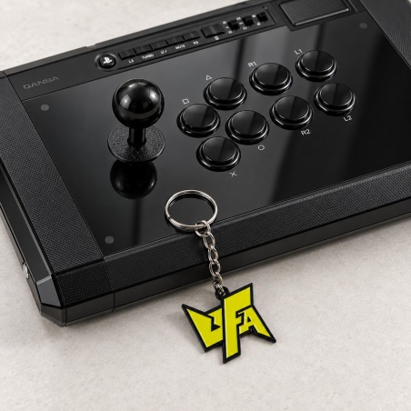 Keychain — UFA, on an arcade stick