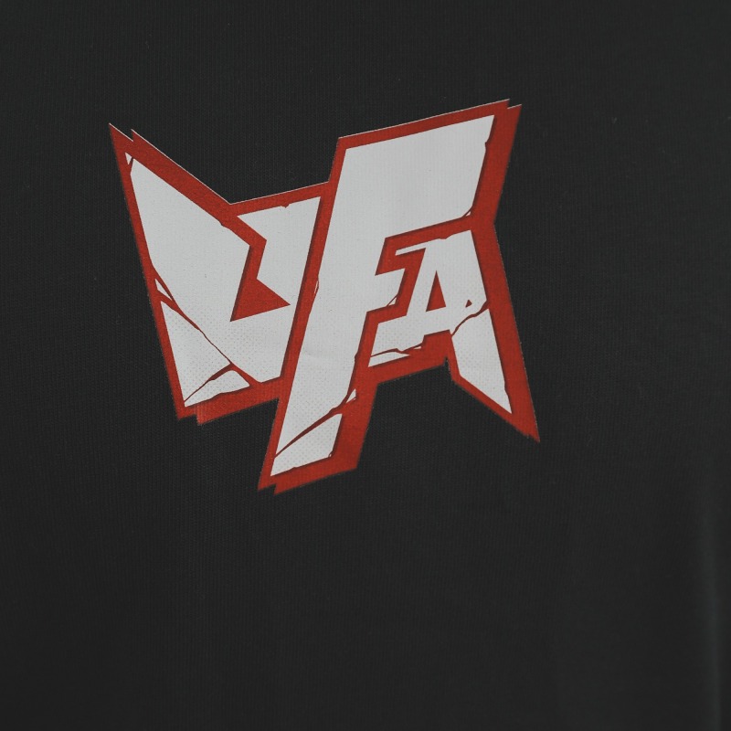 Rivals Eternal Tee — UFA × Arc System Works, chest logo detail